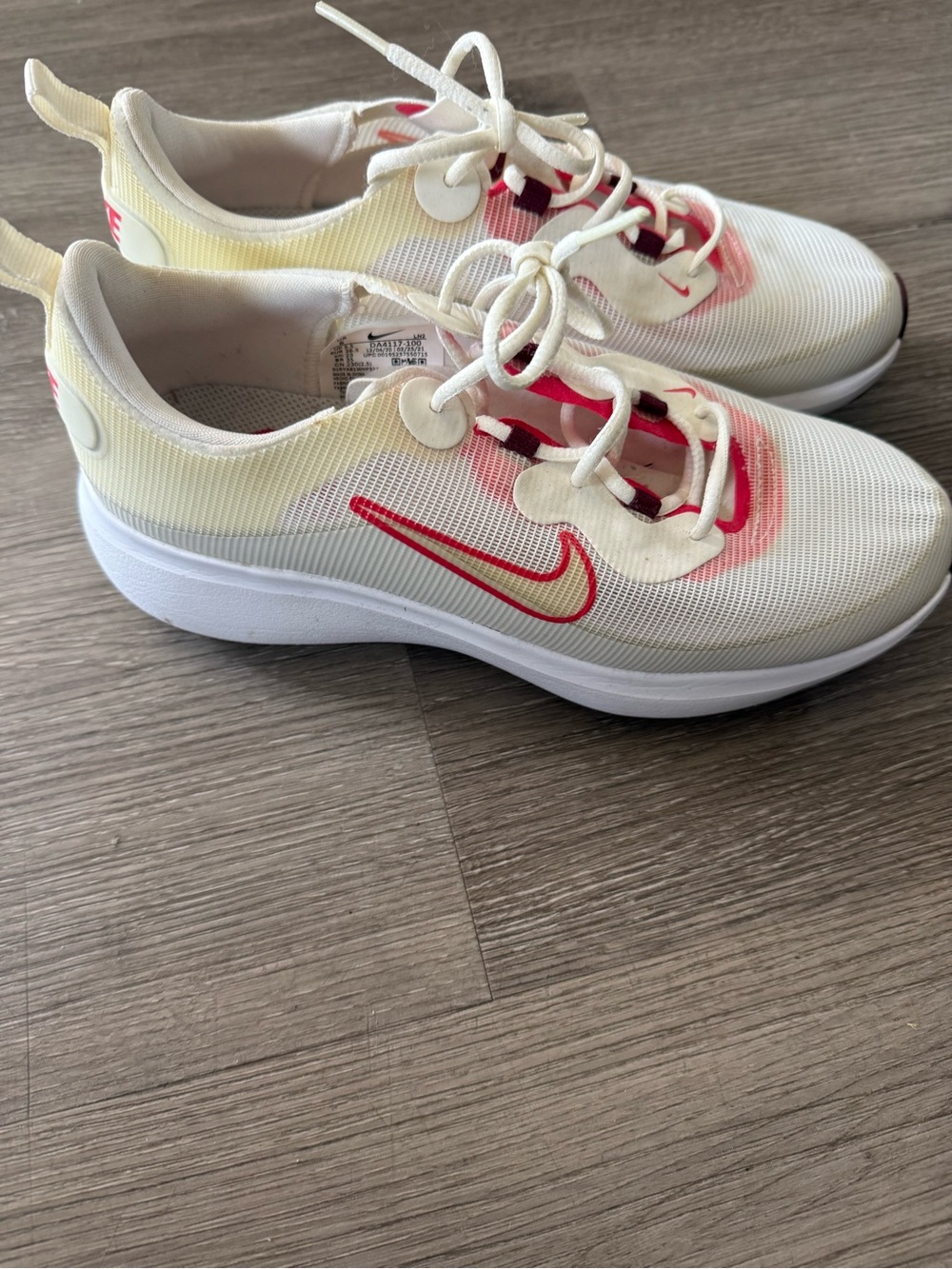 Nike Women's Cream/White Sneakers with Red Swoosh